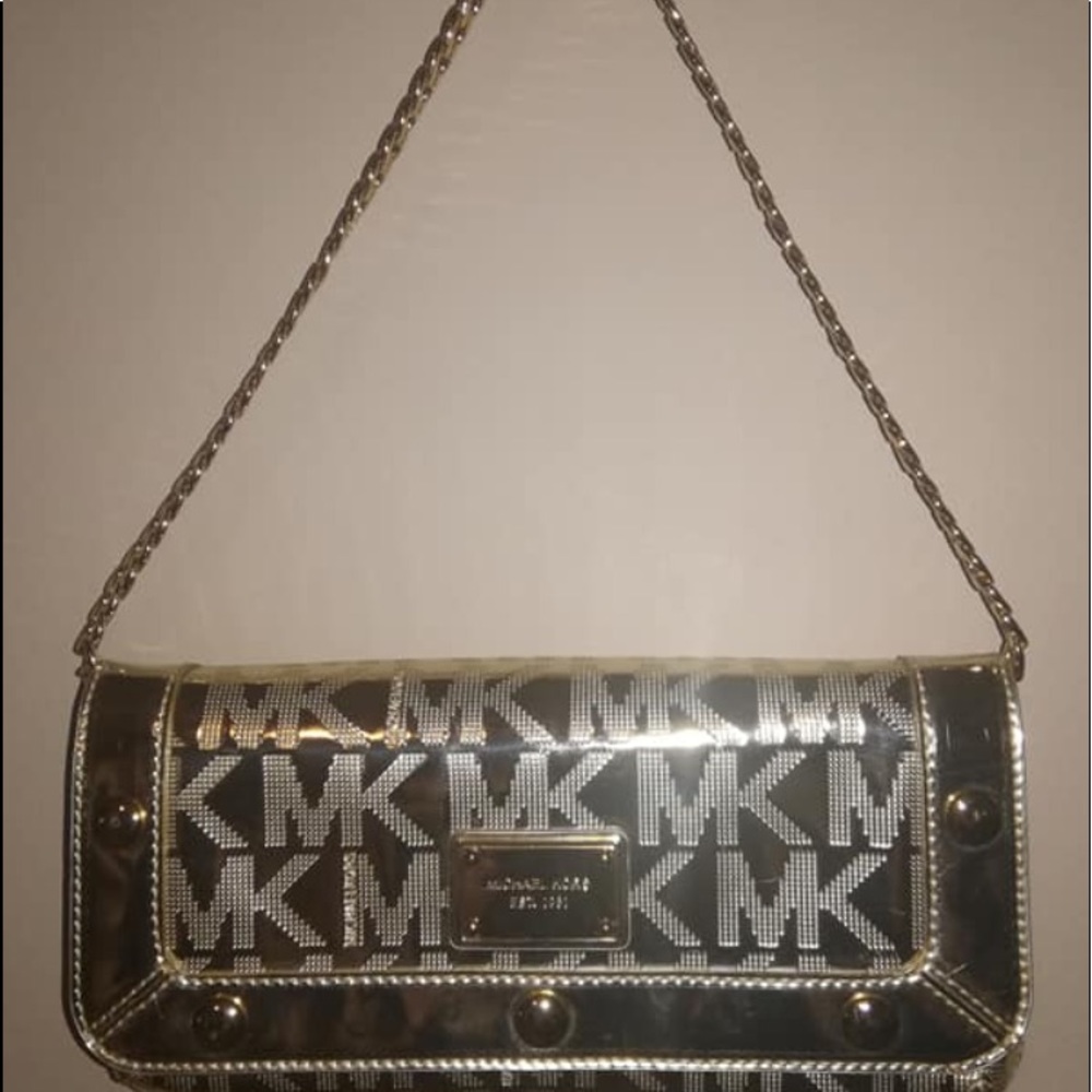 Sold Authentic Michael Kors Clutch updated pics ;)